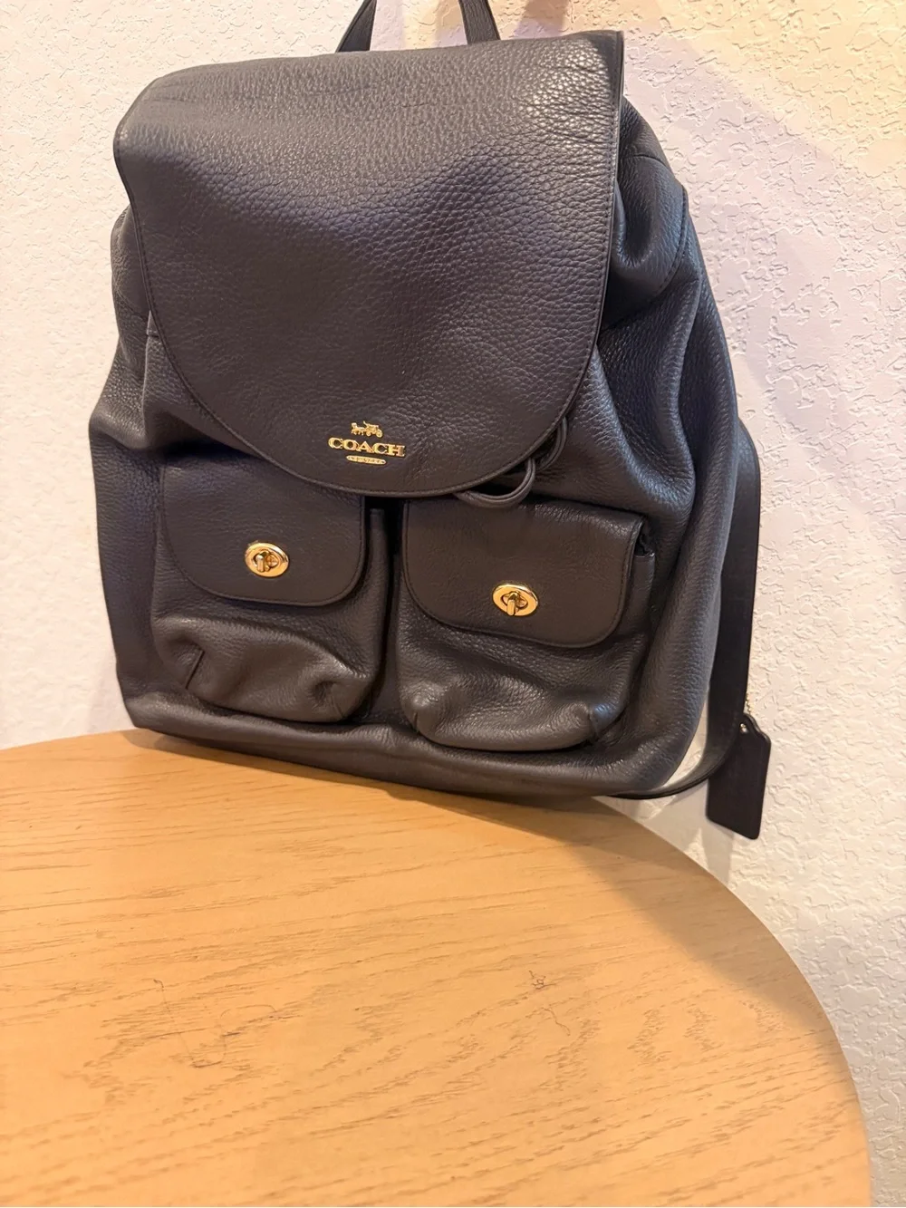 COACH Black Pebbled Leather Drawstring Backpack with Front Pockets